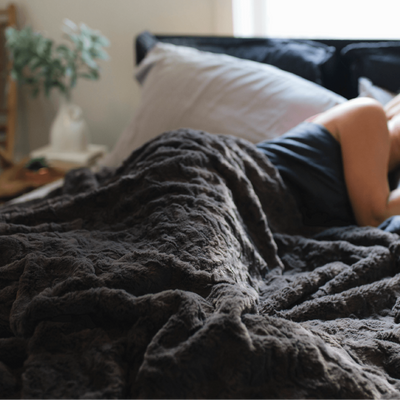 Faux Fur Cozy Throw + Duvet Weighting Comforts